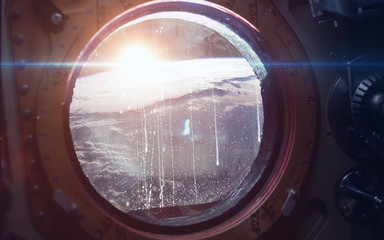 Earth - Beauty of solar system planet in spaceship window porthole. Elements of this image furnished by NASA © Vadimsadovski
