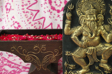 Indian spiritual art - golden Ganesha elephant on background with ornament