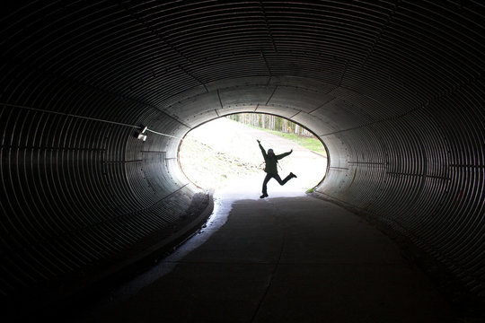Tunnel and girl in motion - Powered by Adobe