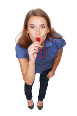 Female blowing a whistle and pointing at you