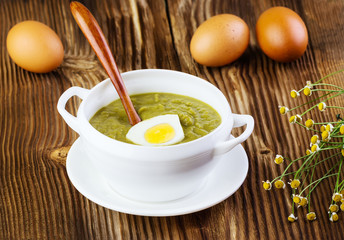 green soup-cream with egg