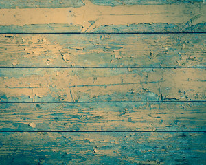 Fototapeta na wymiar Old wood with paint peeling off. Old wooden background/ texture