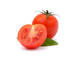 Fresh tomato with basil isolated on white background