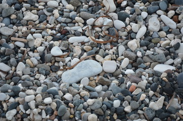 Big pebble in small ones