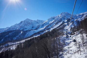 Winter mountains panorama with ski slopes. Caucasus