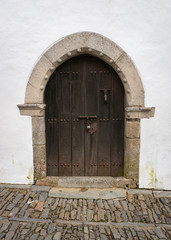 Old door in the city of Lisbon, Portugal