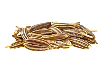 Close up of cumin seeds on white background