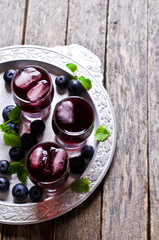 Transparent drink blueberries