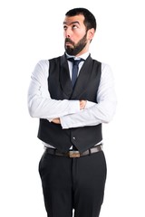 Luxury waiter making unimportant gesture
