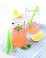 Grapefruit drink with lemon and mint