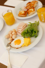 breakfast Fresh bread rolls, pancakes honey Turkish sweets, orange juice