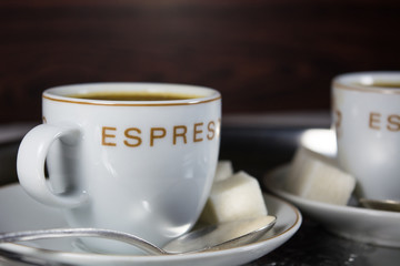  two cups with black coffee