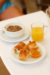 breakfast Fresh bread rolls, pancakes honey Turkish sweets, orange juice