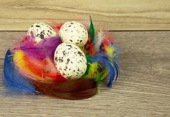 Easter eggs on the old wooden tabletop