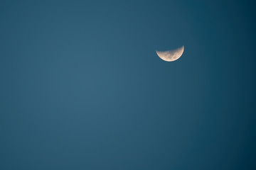 Obraz na płótnie Canvas Half Moon with blue sky background