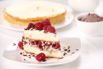 tasty sponge cake with raspberries 