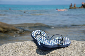 Obraz premium Flip-flops on the Beach