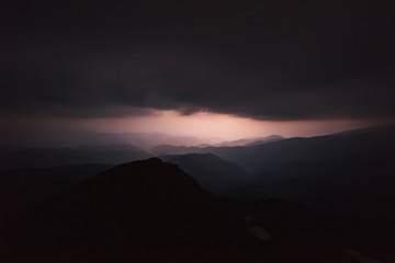 Carpathian Mountains. The light in the night sky