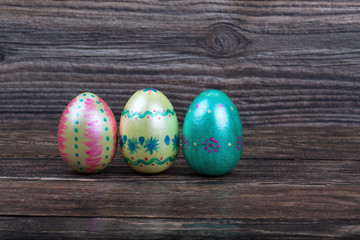 Traditional Easter eggs on wooden backgorund