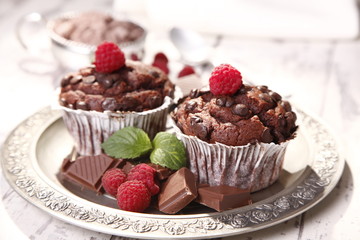 delicious muffins with raspberries and chocolate 