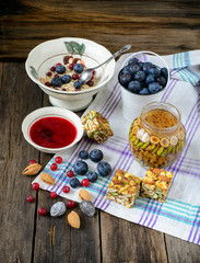 Delicious energy breakfast: oatmeal, blueberries, cranberries, c