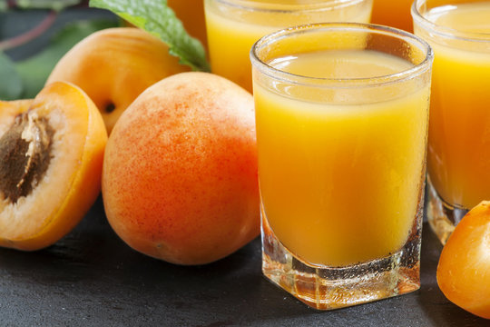 Freshly squeezed apricot juice, selective focus