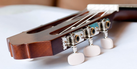 Headstock of classical guitar close up
