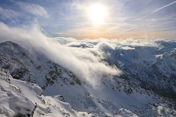 Fototapeta na wymiar Winter landscape of high snowy mountains 