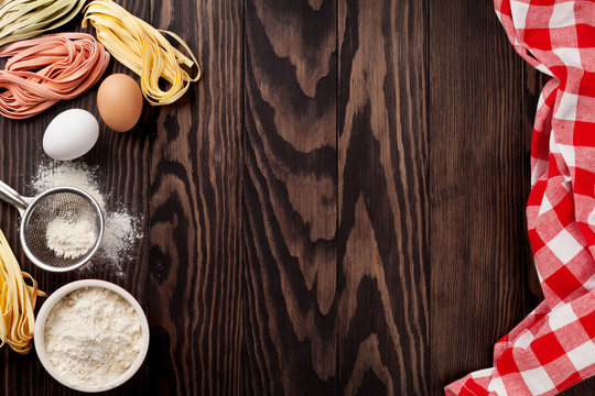 Kitchen table with utensils and ingredients
