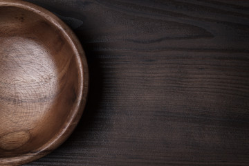  wooden salad bowl on the brown table