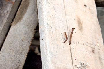 two nail pile of old wood