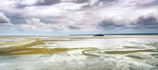 Low tide in Mont Saint Michel Bay. Normandy, France.