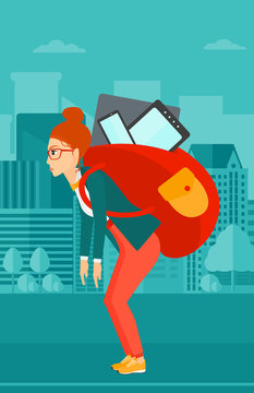 Woman with backpack full of devices.