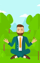 Businessman meditating in lotus pose.