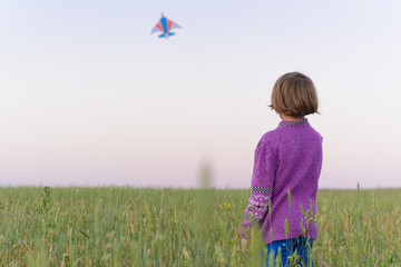 The girl launches a kite