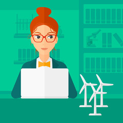 Woman working at laptop. 