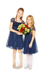 Two beautiful girls with a bouquet of flowers