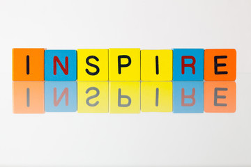 Inspire - an inscription from children's  blocks