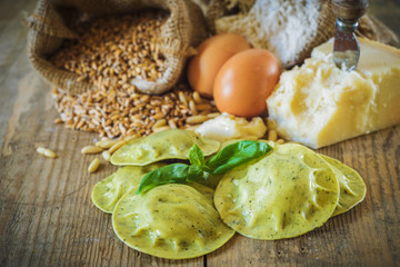 Dumplings / ravioli with cheese, basil and pine nuts, pesto. Pas