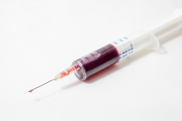 Fototapeta premium syringe blood collection to improve the patient's health 