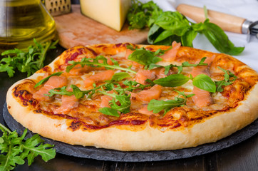 pizza with smoked salmon and arugula