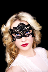 Obraz premium Fashionable woman in mask with red lips