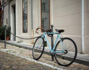 Fototapeta na wymiar Bike on coblestone streets of Vienna in Austria
