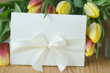 tulips and white paper card
