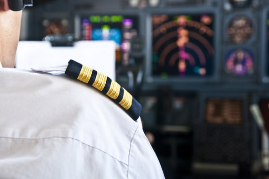 Captain epaulet - shoulder of a jet airliner pilot