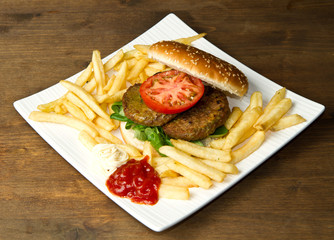 Beef Burger and french fried with cheese and vegetable 
