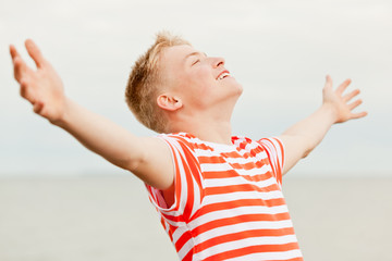 Close up of teen with open arms