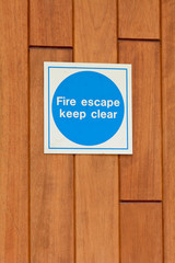 Fire escape - keep clear sign on door