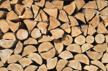Pile of wood for the fireplace, background
