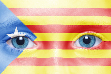 child's face with catalan flag - obrazy, fototapety, plakaty